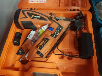 a tool box with a stapler and a stapler in it