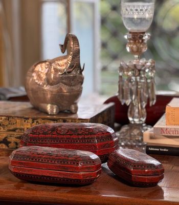 a table with a bunch of decorative items on top of it