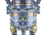 an image of a blue and gold vase with a lion on it