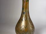an image of a vase on a stand against a white background