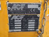 two signs on the side of a yellow truck
