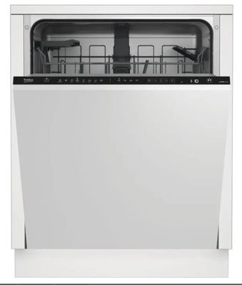 un lave-vaisselle blanc posé sur un comptoir blanc