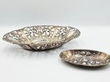 pair of silver plated bowls and a silver plated bowl