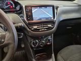 a dashboard of a car with a gps device in it