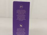 a close up of a purple box on a white surface