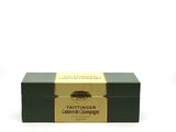 the box is green and gold with a black lid