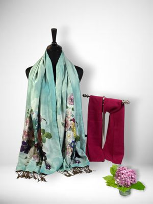 an image of a scarf and a towel on a mannequin