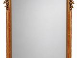 an image of a mirror with a gold frame on a white background
