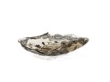 a glass bowl with a bird design on it