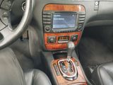 a car dashboard with a steering control in it