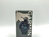 the watch is in the box on a white surface