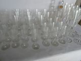a lot of empty wine glasses sitting on a table