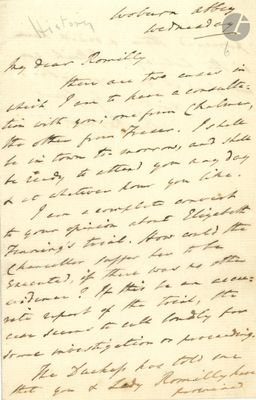 lettre manuscrite écrite à l'encre noire sur une feuille de papier