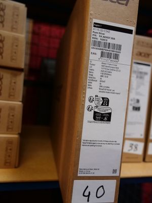many packages on a shelf in a store