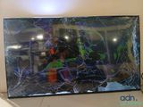a picture of a broken tv screen on the wall