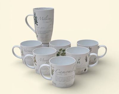 six tasses à café blanches empilées les unes sur les autres sur une table