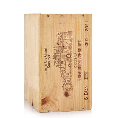 the wooden box is holding a bottle of wine and a bottle opener