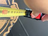 a person holding a measuring tape in their hand