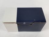 a blue and white box on a white surface