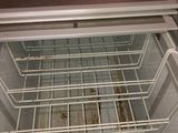 an open refrigerator with a lot of food inside of it