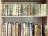a book shelf with many books on it