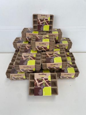 a lot of boxes of chocolate sitting on a table