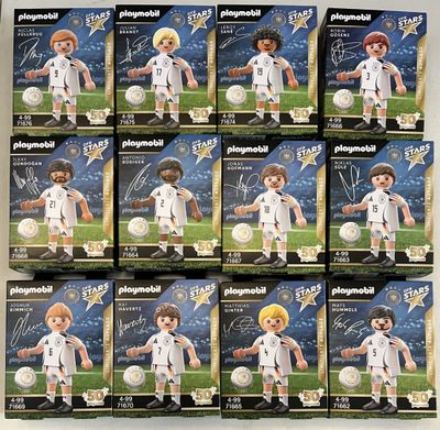 six boxes of playmobil soccer action figures of a boy with a soccer ball