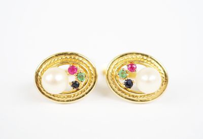 an image of a pair of earrings with pearls and gems