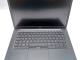 the laptop is open and ready to be used on the desk