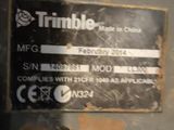 a sign on the side of a machine that says trimble