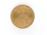 an image of a gold coin on a white surface