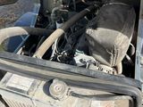 a truck with a large engine in the back of it