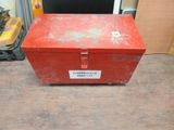 a red box that is sitting on the floor