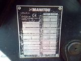 a sign on the side of a machine that says manitul