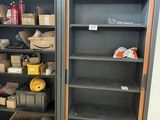 a metal cabinet that has many items in it