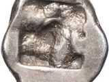 a close up of a silver coin with a horse on it
