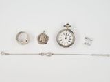 an assortment of jewellery including a watch, bracelet, and ring