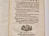 an open book with a picture of a bird on it