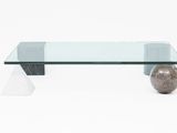 an image of a glass coffee table with a ball on top of it