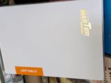 a white box that has a gold logo on it