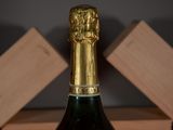 a bottle of wine that is sitting on a table