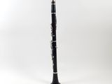 an image of a black and silver clarinet on a white background
