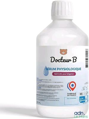 une image représentant une bouteille de liquide sur laquelle figure un ours en peluche