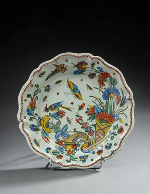 an image of a plate with birds and flowers on it