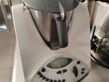 a blender that is sitting on a counter in a kitchen