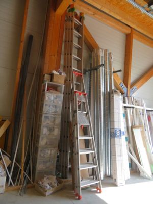 a ladder that is leaning against a wall in a building