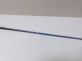 a close up of a golf club on a white surface