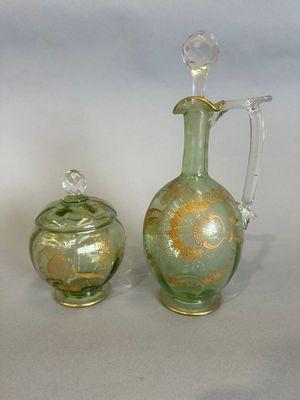 three glass vases sitting next to each other on a table