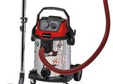une image représentant un aspirateur muni d'un tuyau rouge