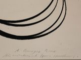 a black and white drawing of three bananas on a table